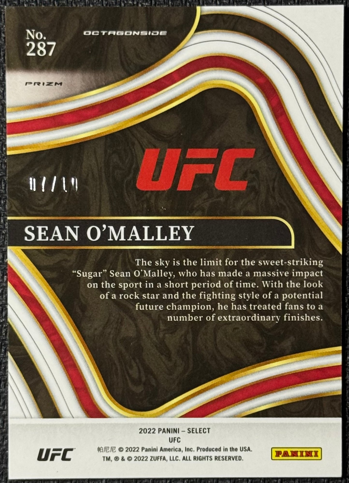 2022 Panini Select UFC Sean O'Malley Gold Disco Octagonside #/10