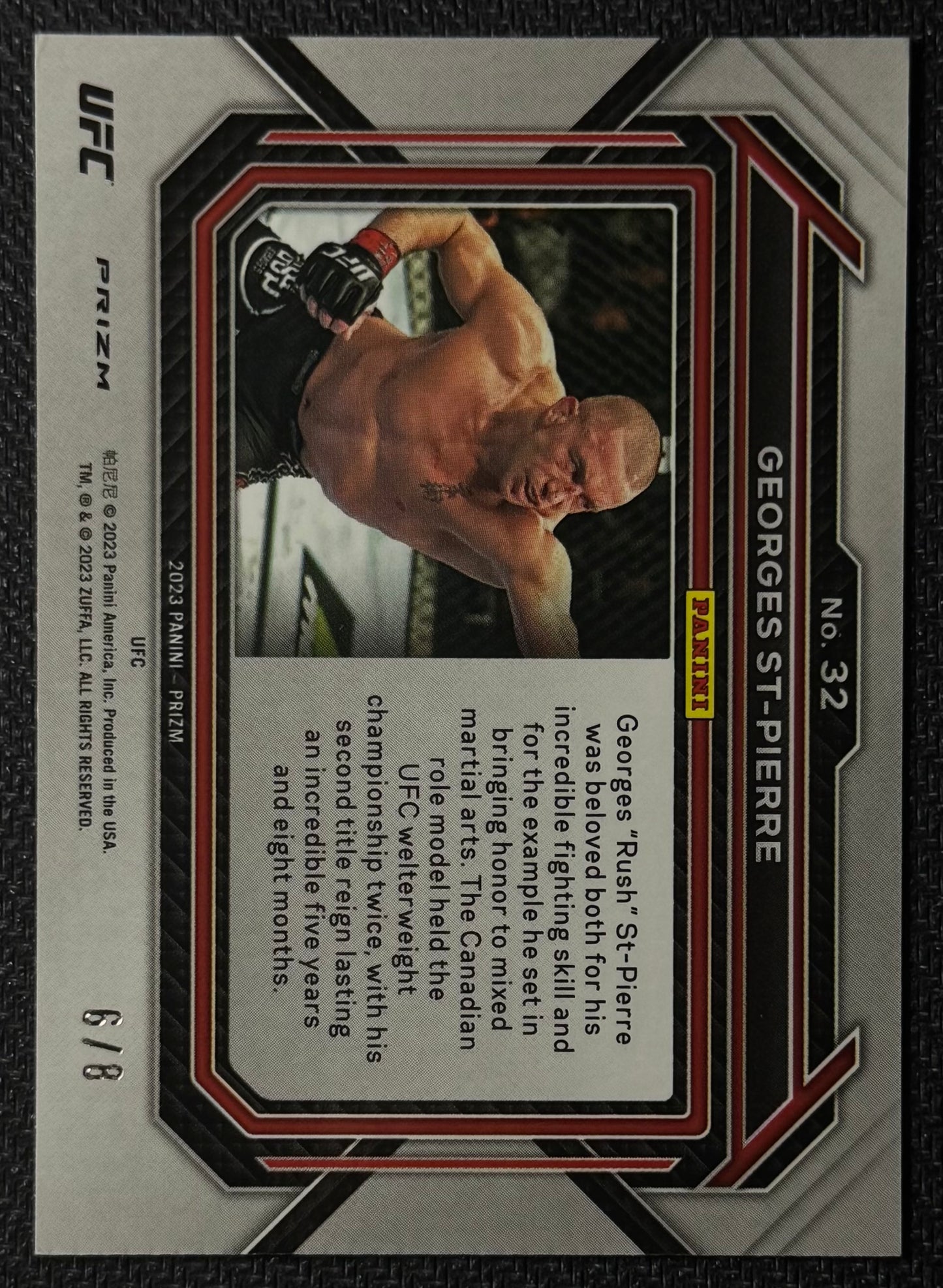 2023 Panini UFC Prizm Georges St-Pierre #32 Lucky Envelopes Prizm #/8